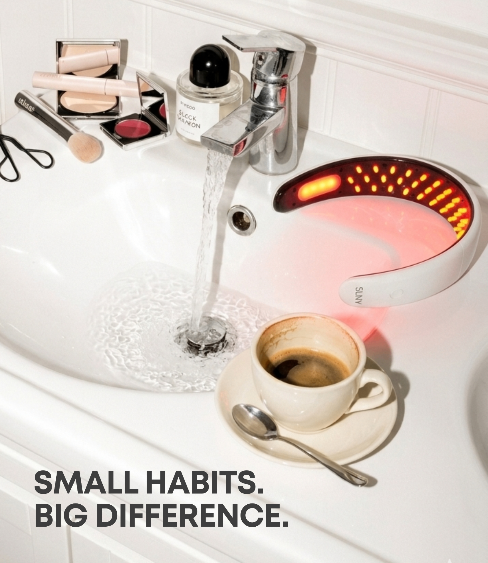 Solaris LED headband on a bathroom counter with coffee and skincare